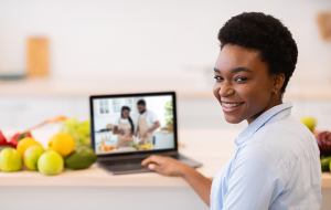 Woman watching cooking classes online
