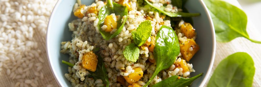 Delicious rice salad with pumpkin and spinach